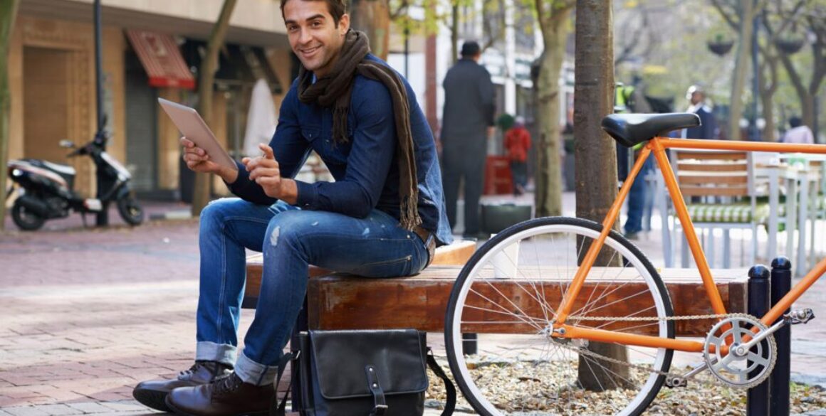 men-model-in-park-with-bike